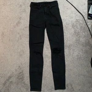 Black skinny jeans with rips
